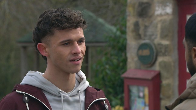 Jacob looks annoyed in Emmerdale