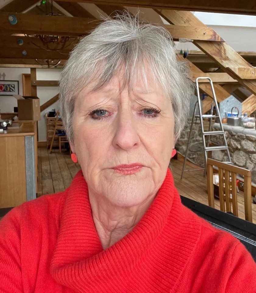 A restaurant owner with a sad expression.