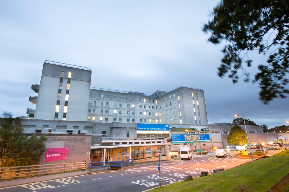 Derriford Hospital in Plymouth, UK at dusk.