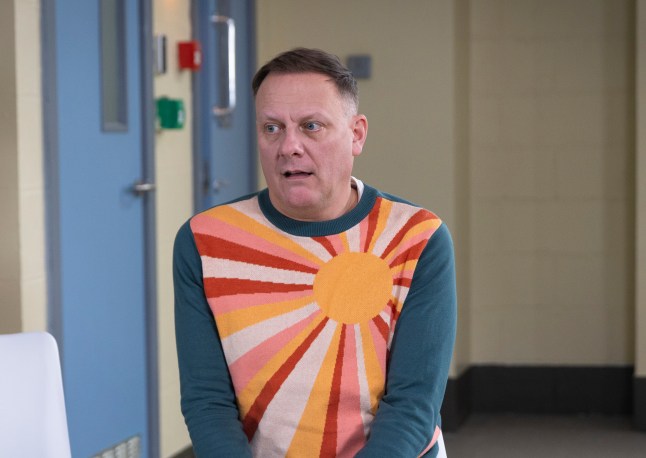 Sean looks worried in Corrie