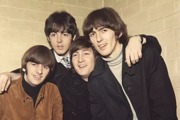 The Beatles pose for a portrait in circa 1965