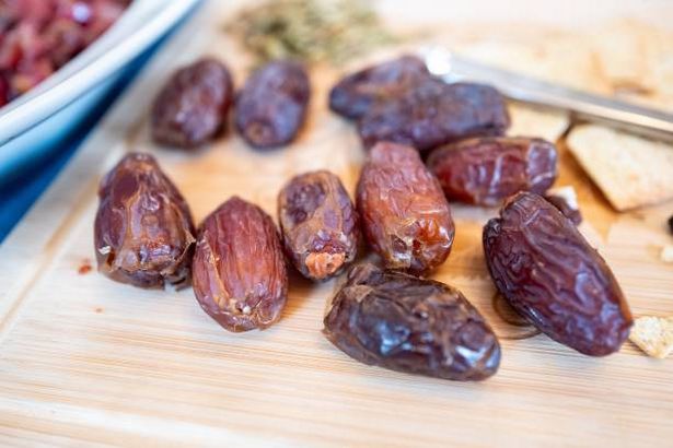 Dates on a chopping board