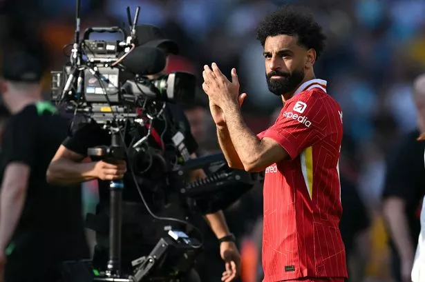 Mohamed Salah applauds the Liverpool faithful after they they beat Wolves 2-0 at Anfield in Jurgen Klopp's final game in charge