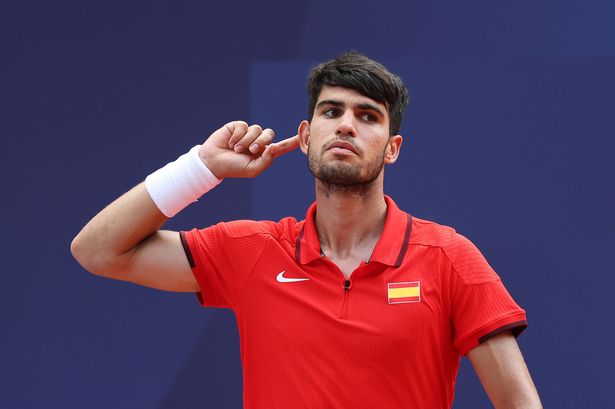 Carlos Alcaraz of Team Spain celebrates against Tommy Paul of Team United States during the Men's Singles Quarter-final match on day six of the Olympic Games Paris 2024 at Roland Garros on August 01, 2024 in Paris, France. 