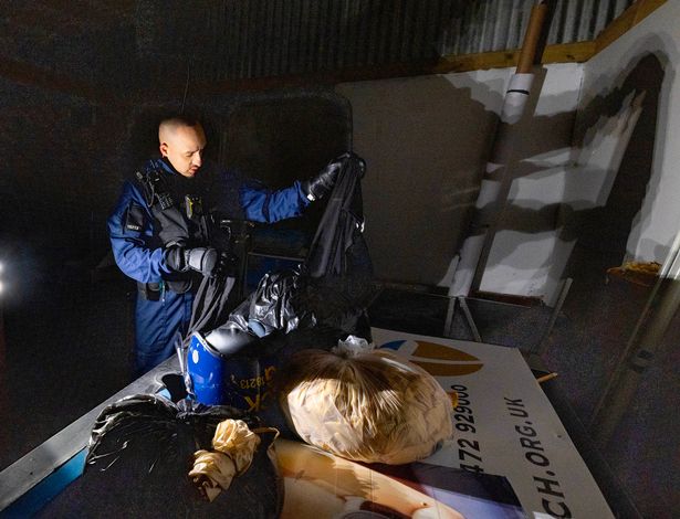 Officers at the scene of a warrant near Strangeways