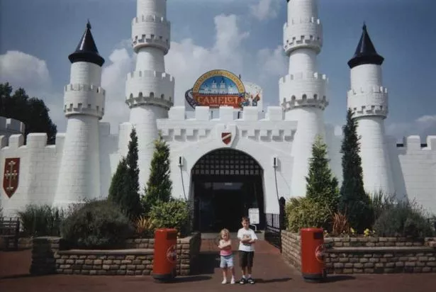 children wait patiently to enter Camelot theme park in Chorley, Lancashire