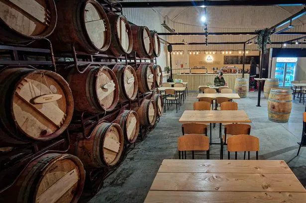 Inside The Barrel Store in the Jewellery Quarter showing barrels and tables