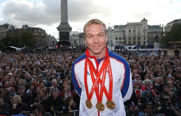 Sir Chris Hoy with his gold medals in London's Trafalgar Square