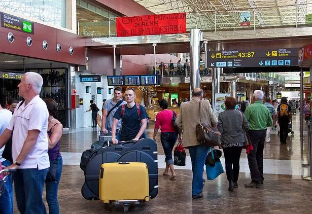 Passengers at the Airport Reina Sofia in Tenerife