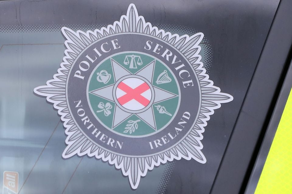A stock picture of a Police Service of Northern Ireland (PSNI) logo badge in Belfast Northern Ireland (Niall Carson/PA)