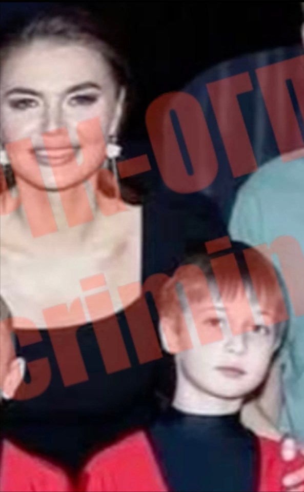 Photo of Alina Kabaeva and a young boy, purportedly Vladimir Putin's son.