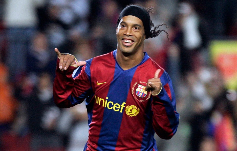 Ronaldinho, FC Barcelona player, celebrating a goal.
