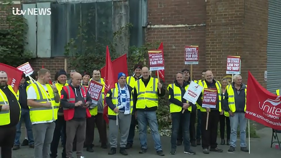 Bus drivers on strike for fair pay.