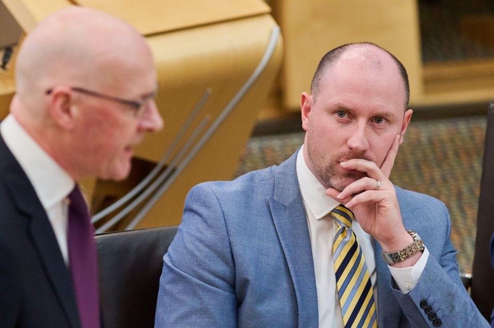 John Swinney and Neil Gray at First Minister Questions.