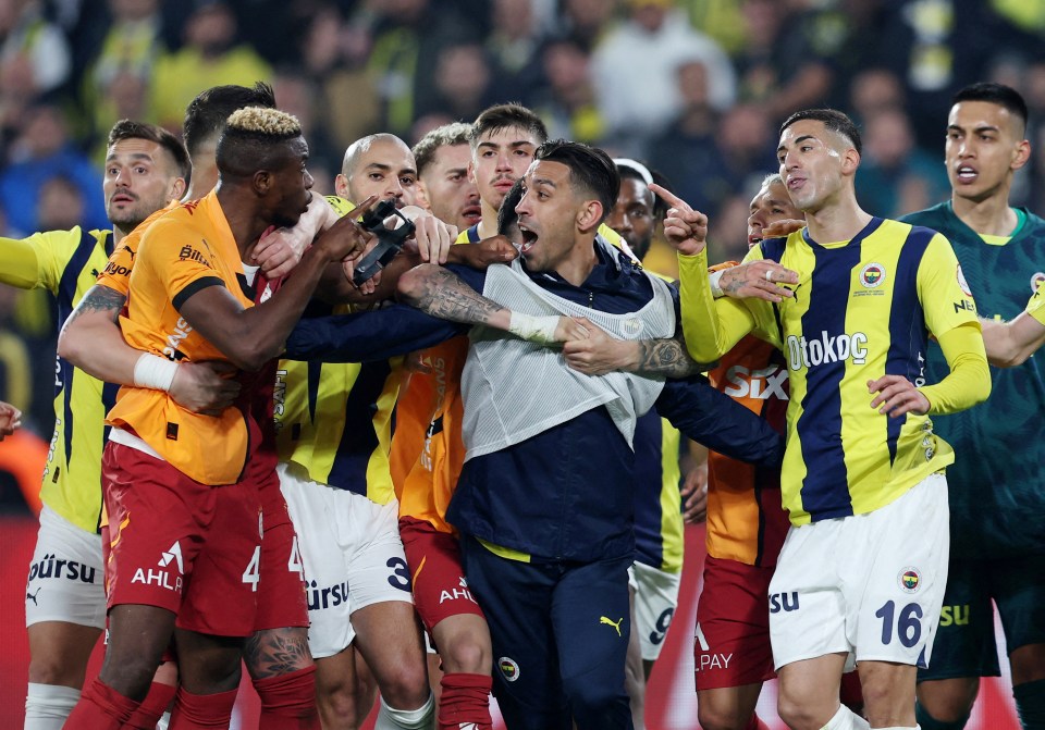 Soccer players in a heated altercation.