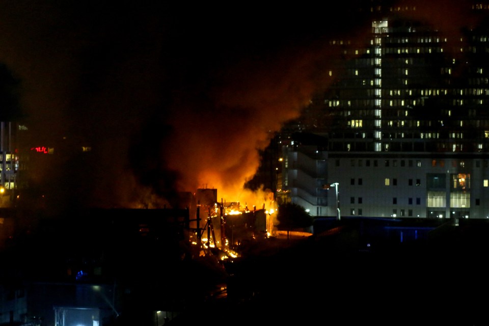 Large fire at a recycling plant at night.