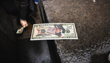 'Trump Dollar' lying on the pavement.