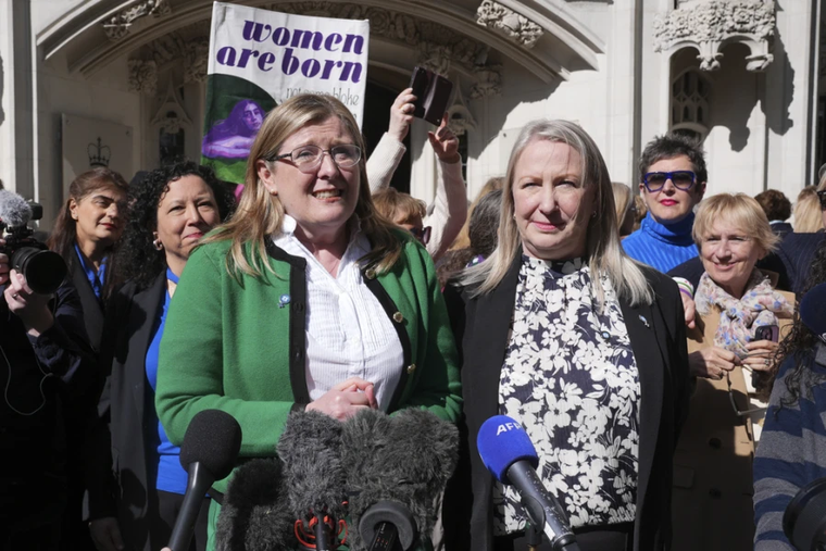 Susan Smith (left) and Marion Calder, co-directors of For Women Scotland, with campaigners celebrate outside the U.K. Supreme Court in London on April 16, 2025, after the terms in the Equality Act were ruled to refer to a biological woman and biological sex.