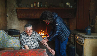 Dr. Godineau, from the Maison de Sante in La Bastide-de-Serou, visits one of his patients, Andre, 75, who has no car and lives in a remote hamlet