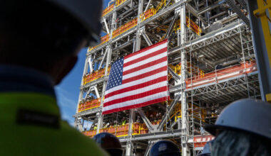 A large US flag hangs on a liquefied natural gas export facility in Port Sulphur, Louisiana, US.