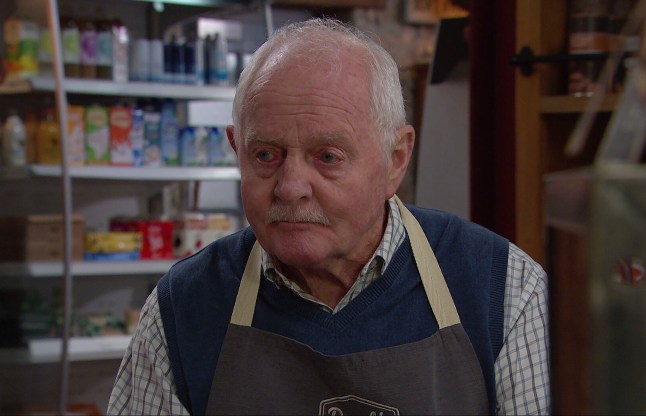 Eric Pollard looking sad and worried in the shop in Emmerdale.