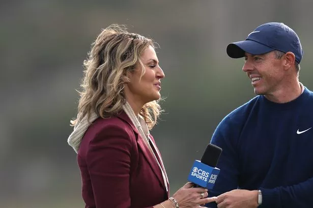 PEBBLE BEACH, CALIFORNIA - FEBRUARY 02: Rory McIlroy of Northern Ireland is interviewed by Amanda Balionis after winning the AT&T Pebble Beach Pro-Am 2025 at Pebble Beach Golf Links on February 02, 2025 in Pebble Beach, California. (Photo by Harry How/Getty Images)
