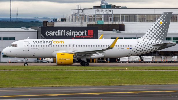 A commercial aircraft on a runway outside Cardiff airport 