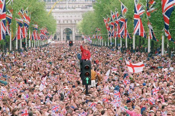 The crowd In front of Buckingham Palace on the anniversary of VE Day back in 1995.