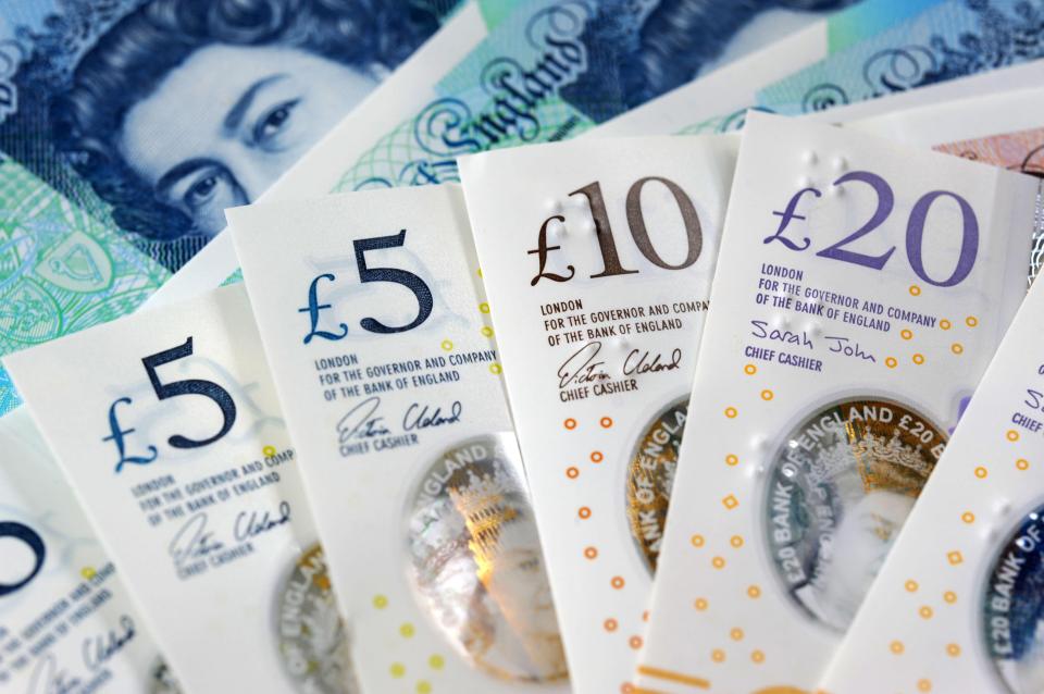 British five, ten, and twenty pound notes.
