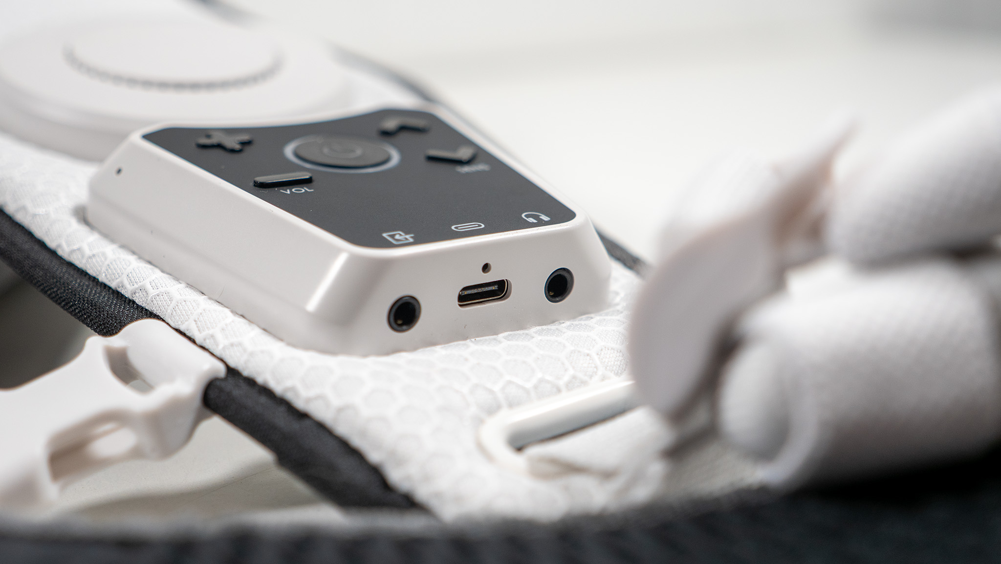 A close-up look at the control panel on the front of the Woojer Haptic Vest 3