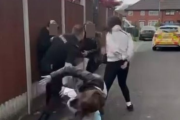 Shocking video footage has shown the moment a mob of teenagers ambushed a lone police officer