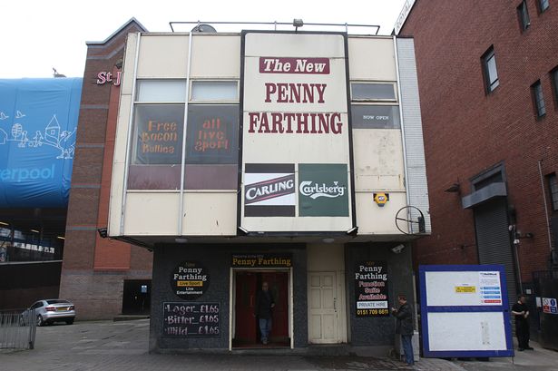 The Liverpool Royal Court Theatre next to The New Penny Farthing pub in Liverpool City Centre