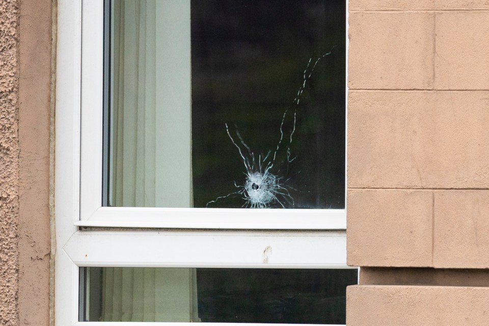 Bullet hole in a window.