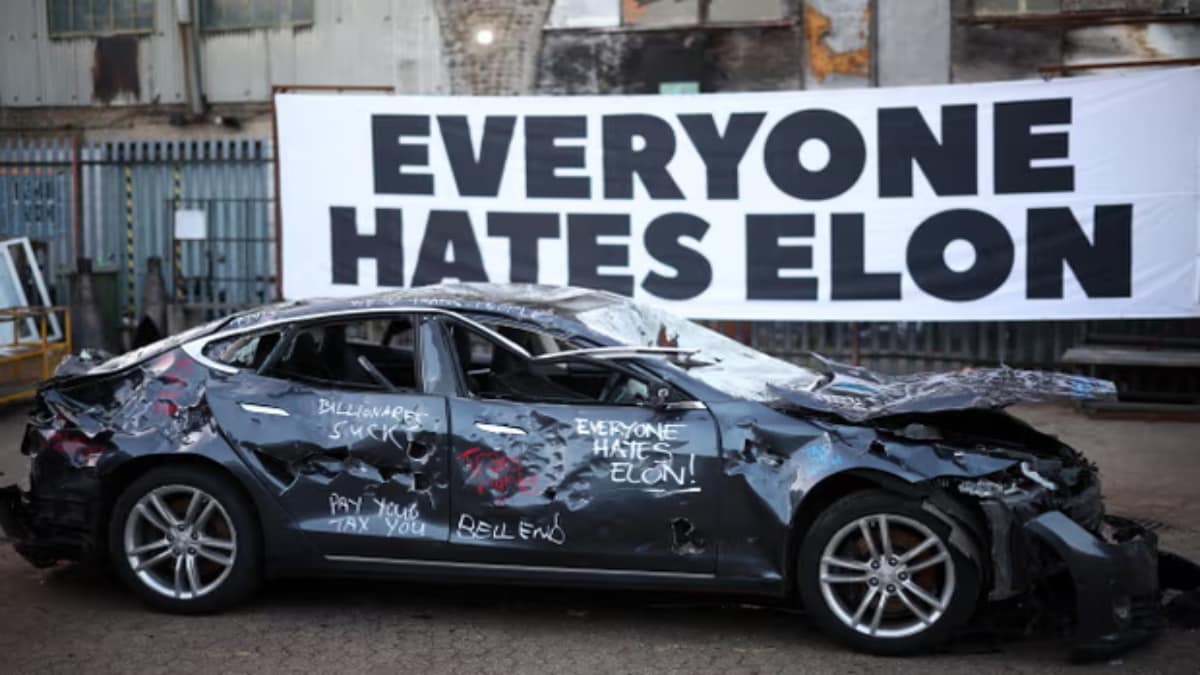 London art project becomes outlet for Musk's critics to release anger by smashing Tesla – Firstpost
