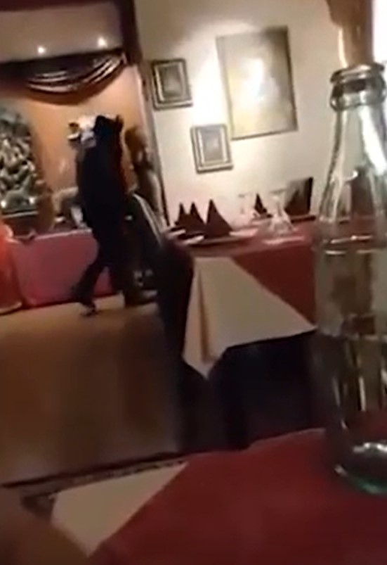 Kanye West and Bianca Censori having dinner in Spain.