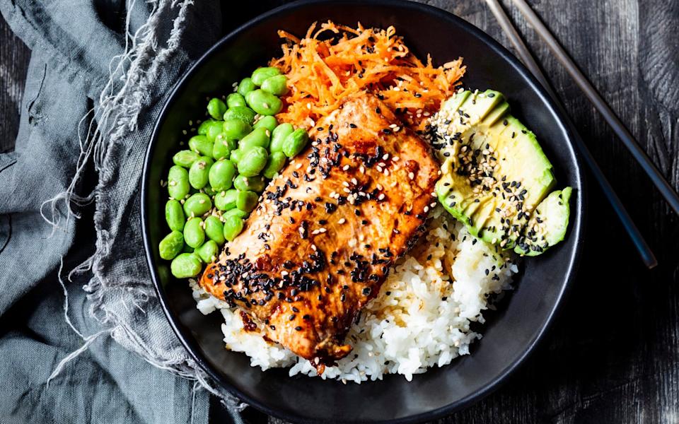 Teriyaki salmon with rice, carrot and edamame