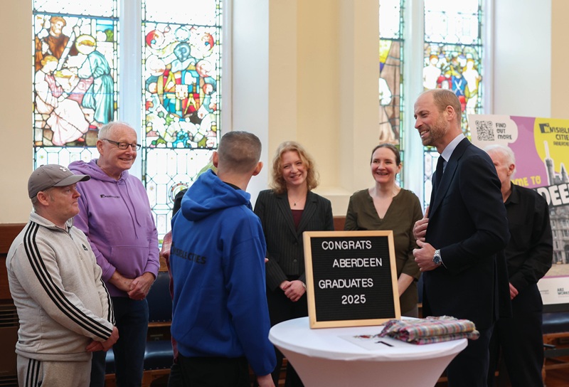 Prince WIlliam is given a tour of Aberdeen by former Big Issue vendor Angus