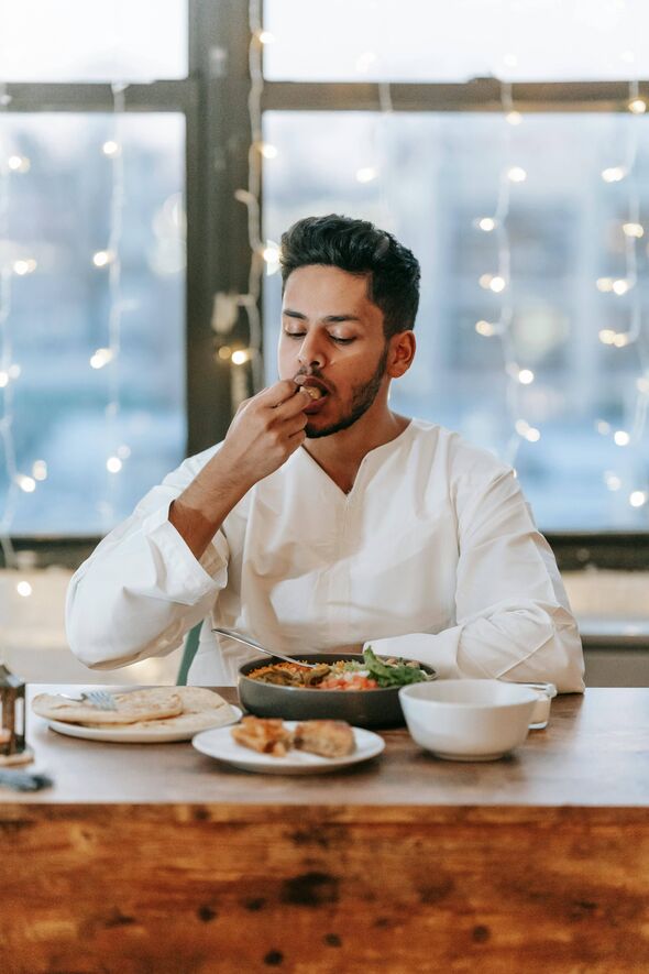 man eating