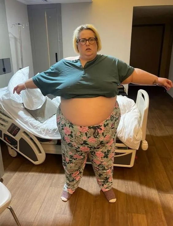 Woman in hospital room after weight loss surgery.