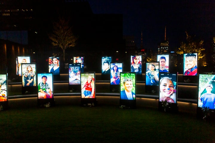 As the sun set, the photos became even brighter, illuminating the entire space, which overlooked the city.