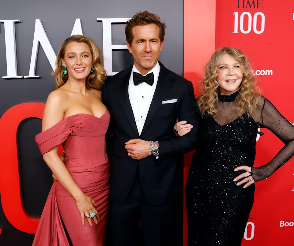Blake Lively, Ryan Reynolds, and Blake's mom posing on a red carpet