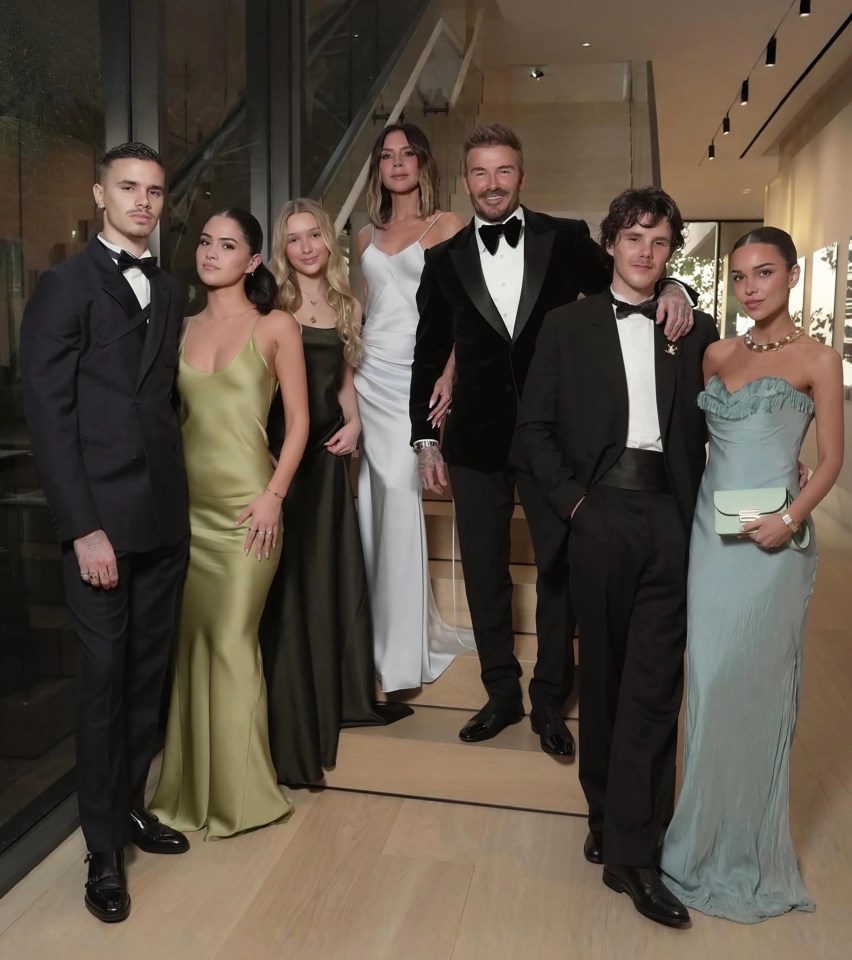 Family in formal wear at a birthday celebration.