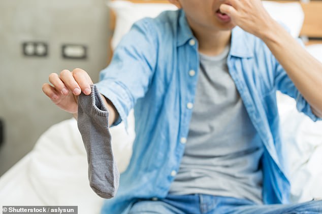 A Chinese man's bizarre habit of sniffing his socks after wearing them all day landed him in hospital after he developed a serious fungal infection in his lungs. Stock image