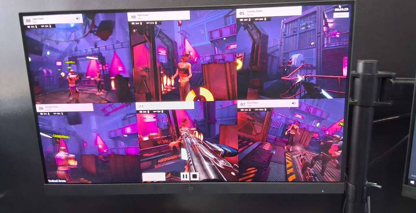 A monitor screen watched by the staff “Game Master” shows the point of view of all six players as they interact with each other and fictional environments and monsters in the game “Undead Arena” Friday at Zero Latency Schaumburg, 309 W. Golf Road.