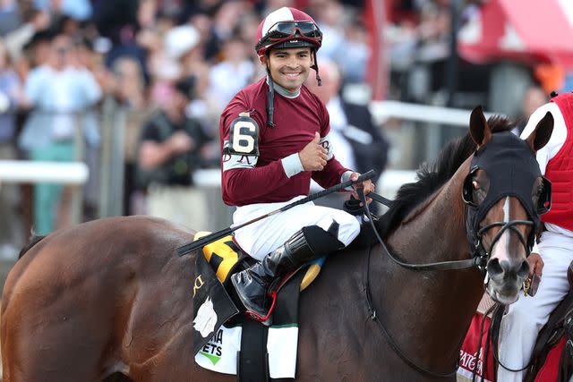 Al Bello/Getty Luis Saez celebrates atop Dornoch after winning the 155th running of the Belmont Stakes on June 8, 2024 in Saratoga Springs, New York.