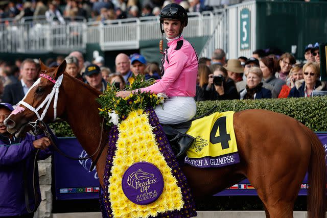 Rob Carr/Getty Florent Geroux in the winners circle aboard Catch A Glimpse #4 after winning the Breeder's Cup Juvenile Fillies on October 30, 2015 in Lexington, Kentucky.