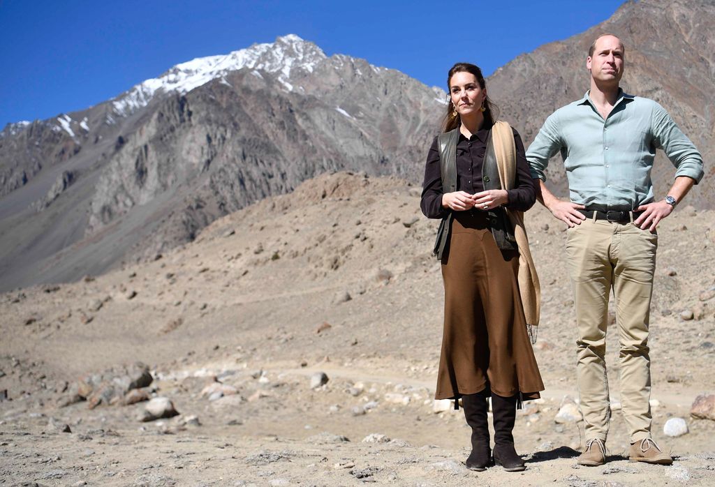 Kate Middleton wearing a satin slip skirt with Prince William at the Chiatibo glacier in the Hindu Kush mountain range on October 16, 2019 in the Chitral District of Khyber-Pakhunkwa Province, Pakistan. 