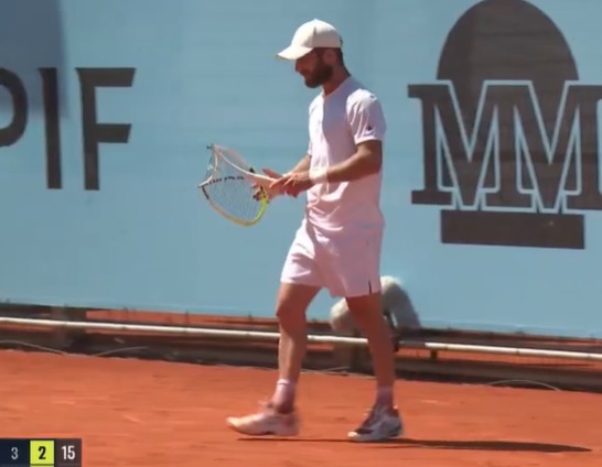 Moutet destroyed his racquet before making his way off the court
