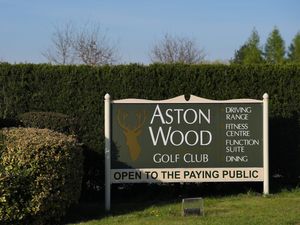 A sign for Aston Wood Golf Club in Birmingham