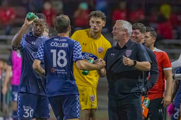 Sean McAuley chats to his Indy Eleven players